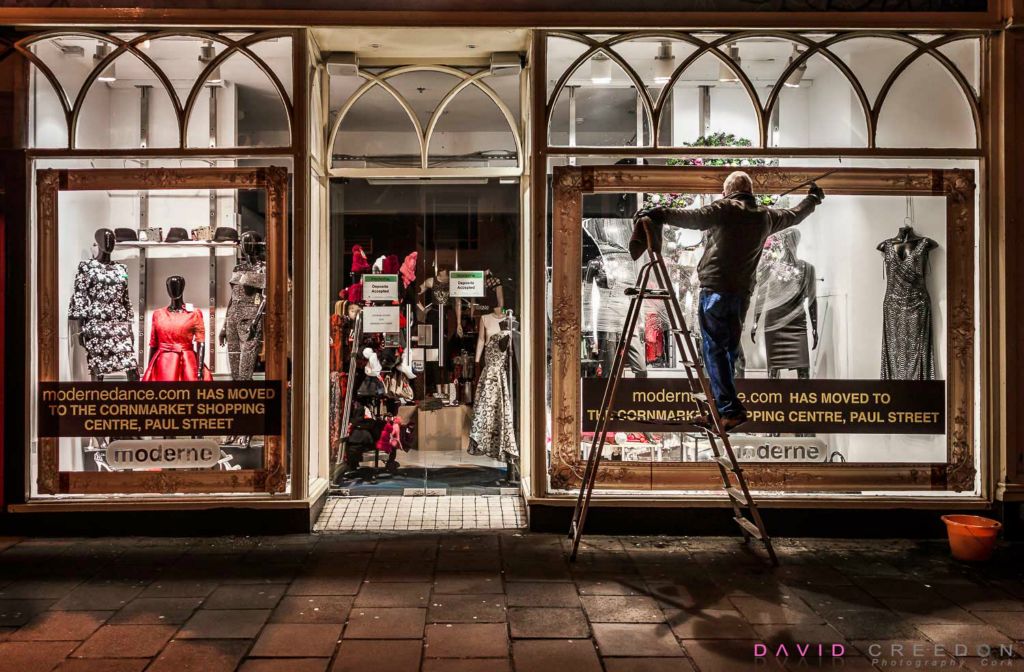 Rory O'Donovan cleaning windowns on Cook Street Cork