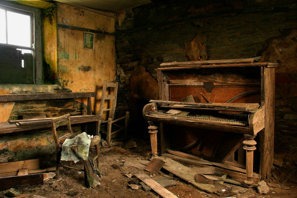  This house was been used as a shelter for cattle. I had not expected to find anything to photograph here but on going into one of the two downstairs rooms I discovered this old battered piano