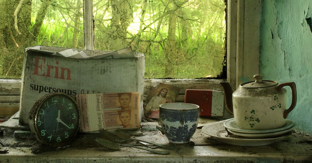 On a window sill is a clock with its hands stopped at twenty one minutes past twelve and lying next to it an Irish Sweepstakes ticket that could have changed someone’s life forever.  