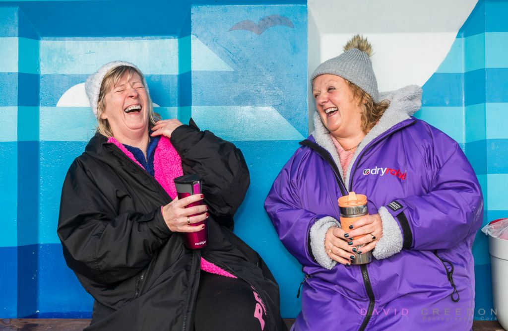 Having with a coffee and have a good laugh after their morning swim at Fountainstown, Co. Cork. 