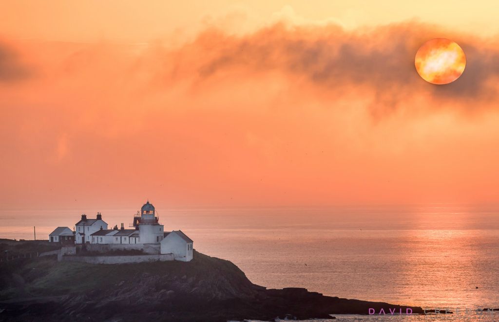 Sunrise at the Roches Point Lighthouse in Co. Cork, Ireland.