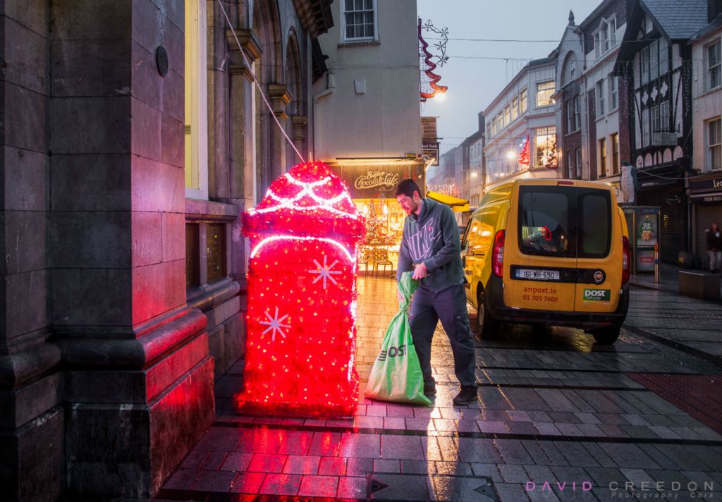  A post office worker collects letters from a designated Santa's postbox outside the GPO on Oliver Plunkett Street for a special delivery to the North Pole. 