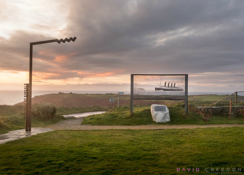 Sunrise begins to illuminate  a Picture-Perf Sculpture of the liner Lusitania in the memorial garden at the Old Head of Kinsale, Co. Cork, Ireland.