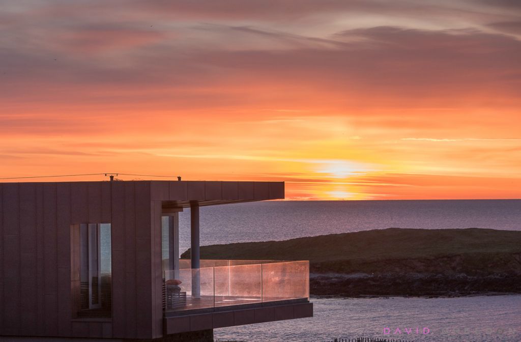 A home with an amazing view and a spectacular dawn over the bay in Ballycorrton, Co. Cork, Ireland. 