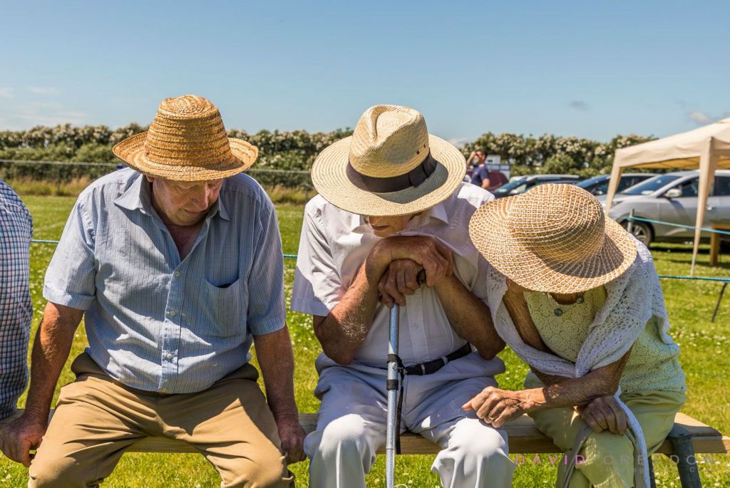 Con Nyhan from Drinagh in deep conversation with John and Marie Kingston of Ballineen at the annual agriculture show in Barryroe, Co. Cork, Ireland. 