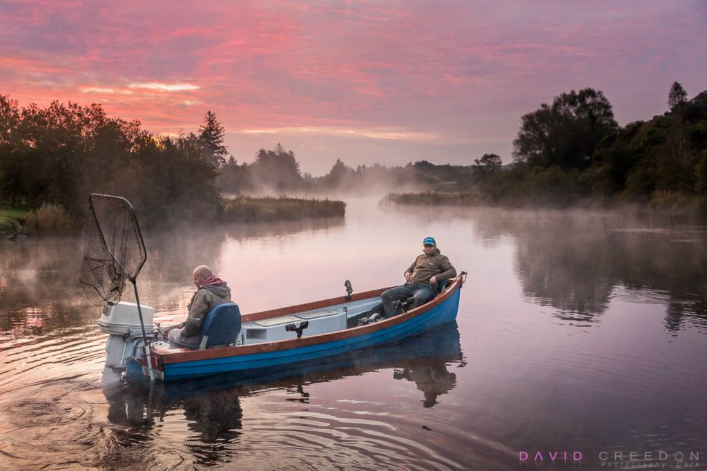 Andrzaj Kowaslka and Jacek Mackowski  head out at dawn for a morning's coarse fishing on Lough Aulla outside Ballingeary, Co. Cork, Ireland.