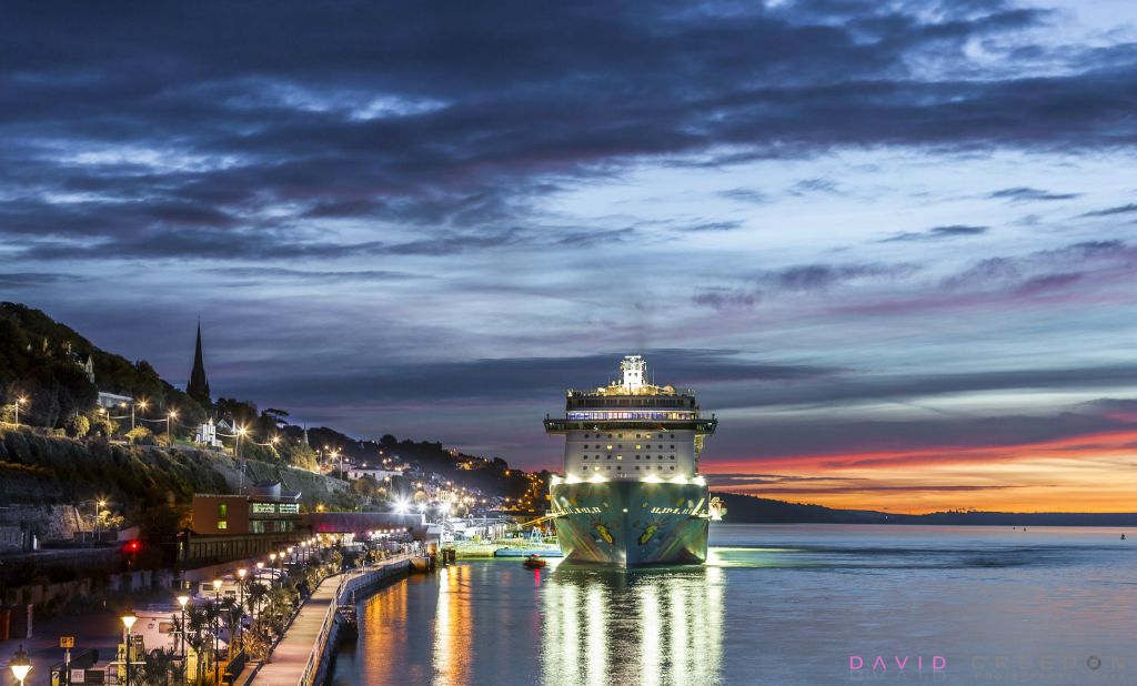 Cruise liner Norwegian Breakaway tied up at her berth before dawn after arriving in Cobh, Co. Cork, Ireland.